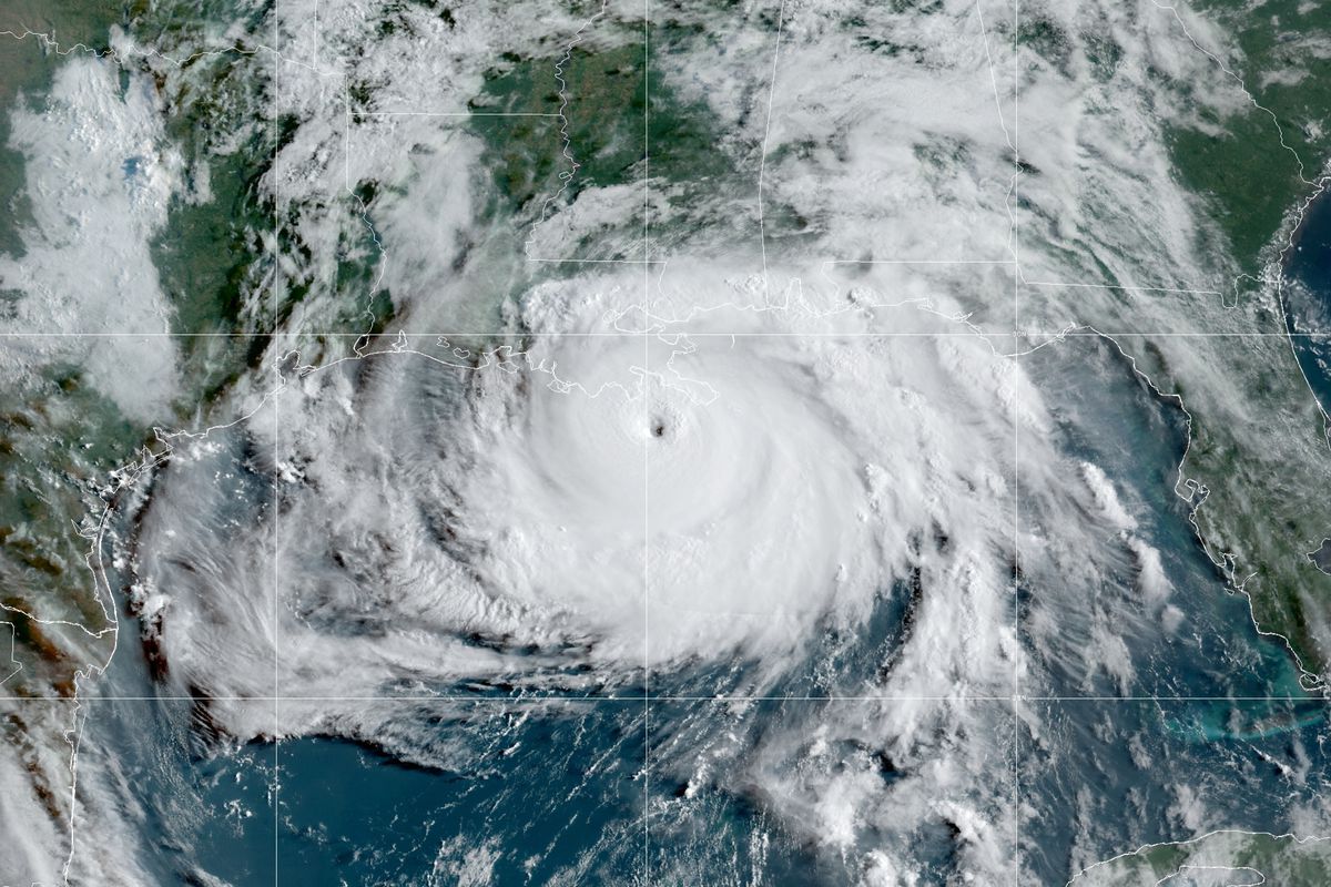 Swirling hurricane cloud from Ida, seen from a satellite view, as it makes landfall in New Orleans.