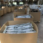 Image of packaged pairs of crutches in a warehouse in MD, USA.